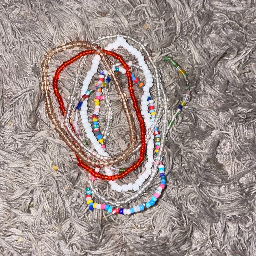 7 plastic beaded bracelets